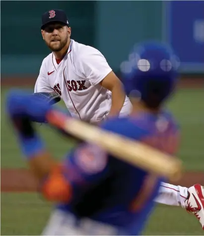  ?? MATT sTonE pHoTos / HErAld sTAFF ?? PROBLEMS FOR STARTERS: Amed Rosario hits a two-run single off Red Sox pitcher Matt Hall during the second inning of the Mets’ 8-3 win on Tuesday night. Below, Red Sox reliever Austin Brice bobbles a ball but eventually makes the play at first base.