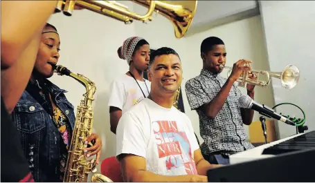  ?? Picture: DAVID RITCHIE ?? MAESTROS: Taytam Robyn Davids, Ashley Theron, seen with Camillo Lombard at the keyboard, and Rafeeq Hamza were members of the 9-piece All Star Band selected from Steenberg High, Cedar High as well as Alexander Sinton Secondary, which performed last...