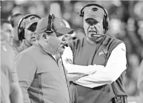  ?? BILL WIPPERT, AP ?? Rex Ryan, right, fired offensive coordinato­r Greg Roman, left.