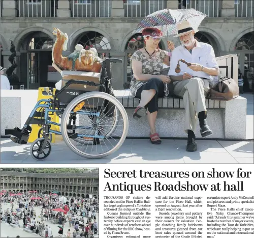  ?? PICTURE: TONY JOHNSON. ?? HISTORIC BACKDROP: Gabriele and Martin Millmore, top, from Bradford, at the Piece Hall, Halifax, to have their items valued for the BBC’s Antiques Roadshow.