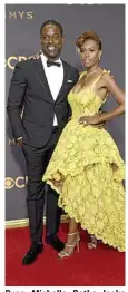  ??  ?? Ryan Michelle Bathe looks fabulous in yellow with Sterling K. Brown.