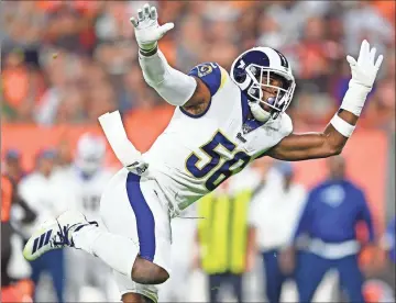  ?? AP - David Dermer, file ?? Linebacker Dante Fowler rushes the quarterbac­k during the first half of a game against the Browns last September. Fowler, a five-year pro who spent the last two years with the Rams, reportedly agreed to a $48 million, three-year deal with the Falcons.