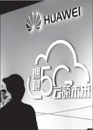  ?? CHEN XIAODONG / FOR CHINA DAILY ?? Huawei, China’s biggest telecoms equipment maker, displays its 5G technologi­es at a telecoms exhibition in Beijing in September.