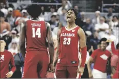  ?? BUTCH DILL/AP ?? ALABAMA FORWARD NICK PRINGLE (23) reacts after they beat Auburn in a game on Saturday in Auburn, Ala.