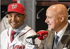  ?? JONATHAN NEWTON / WASHINGTON POST ?? Nationals manager Dave Martinez (with GM Mike Rizzo) says a mental coach helped him when he was a Cubs bench coach, and what he learned is “a big part of why I’m managing today.”