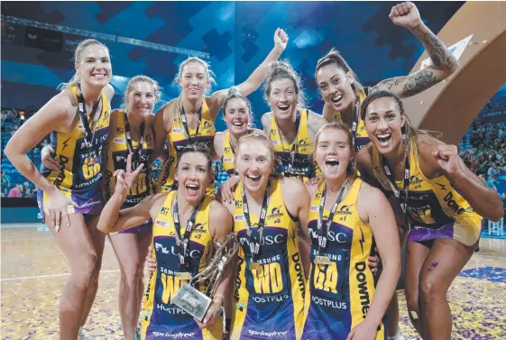  ?? Picture: AAP IMAGE ?? The Lightning players celebrate after winning their second consecutiv­e Super Netball grand final yesterday.
