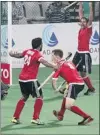 ?? B MATHUR / REUTERS ?? Vancouver’s Scott Tupper ( centre) celebrates his goal with teammates Ken Pereira ( left) and Sukhwinder Singh ( right) in Canada’s eventual 3- 2 loss to India on Wednesday.