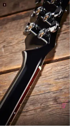  ??  ?? 4 3. Custom wound by Aaron Armstrong, these dualscrew-coil humbuckers have a DC resistance of approximat­ely 8kohms: the bridge unit uses an Alnico V magnet; the neck uses Alnico III. The ‘Storm Rider’ name comes from a meeting Nick and Graham had in...