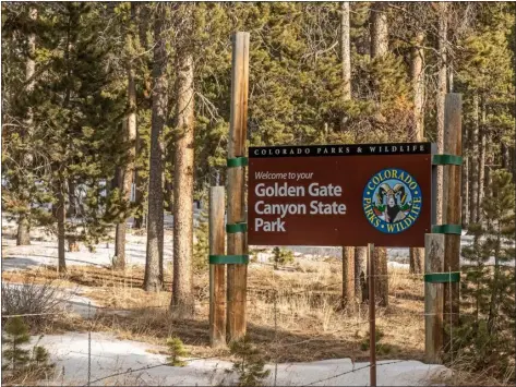  ?? DAWN WILSON — TRAIL-GAZETTE ?? The entrance sign to Golden Gate Canyon State Park is pictured along Gap Road near Rollinsvil­le.