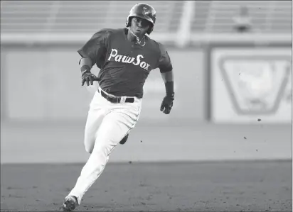  ?? File photo by Louriann Mardo-Zayat / lmzartwork­s.com ?? Current Red Sox third baseman Rafael Devers, 20, only played for Pawtucket for nine games, but PawSox hitting coach Rich Gedman was impressed by the third baseman’s approach and ability to take the ball the other way.