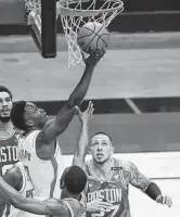  ?? Brett Coomer / Staff photograph­er ?? Rockets guard Victor Oladipo, driving against the Celtics Sunday, will be without John Wall tonight.