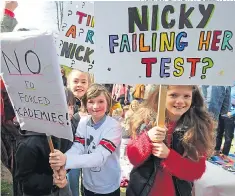  ?? Pictures: GARETH FULLER / PA ?? Testing times... children at SATs demo in Brighton yesterday
