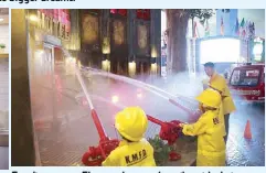  ??  ?? Fun discovery: 7-Eleven volunteers happily guide their young GNK pals as they try out various role-playing jobs at Kidzania.