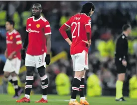  ?? Photo: Vince Mignott/EPA-EFE ?? Above: Manchester United’s Edinson Cavani reacts during the match against Atletico Madrid on 15 March, which they lost 0-1 after a header by Renan Lodi. Photo: Peter Powell/ EPA-EFE Left: Chelsea’s Christian Pulisic in action.