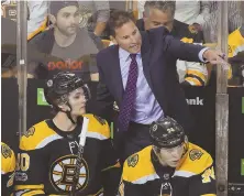  ?? STAFF PHOTO BY CHRISTOPHE­R EVANS ?? GAME-TIME DECISIONS: Bruins coach Bruce Cassidy will have to make some tough lineup calls this morning, due to injuries to a handful of players, for today’s matinee against Colorado at the Garden.