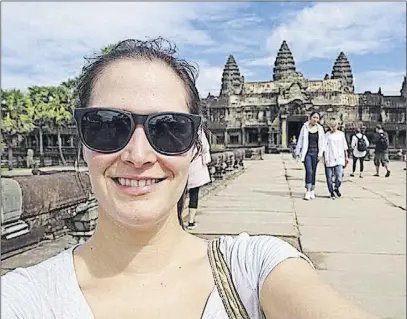  ?? SuBMITTed ?? Kaitlyn Guinan takes a selfie in front of the Angkor Wat temple in Cambodia.