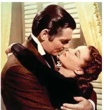  ?? PHOTO: CONTRIBUTE­D ?? Clark Gable and Vivien Leigh's iconic screen kiss in Gone With The Wind.