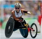  ?? AP ?? Marieke Vervoort warms up for the T52 final at the Rio Olympics.