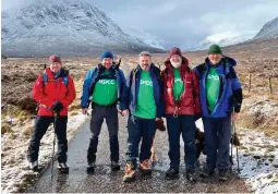  ?? ?? Members of Team Uprising training in Scotland for the trek