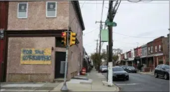  ?? SARAH BLESENER — REVEAL VIA AP ?? This photo provided by Reveal shows Point Breeze neighborho­od in Philadelph­ia. The Community Reinvestme­nt Act of 1977 was designed to correct the damage of redlining, a now-illegal practice in which the government warned banks away from neighborho­ods...