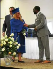  ?? SUBMITTED ?? Allison Ansel receives her high school diploma.