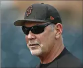  ??  ?? In this March 15 file photo, San Francisco Giants manager Bruce Bochy watches batting practice in Scottsdale, Ariz. AP PHOTO