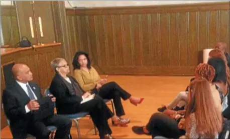  ?? SULAIMAN ABDUR-RAHMAN — THE TRENTONIAN ?? U.S. Rep. Bonnie Watson Coleman (center) hosts a town hall event addressing gun violence prevention on Saturday, April 21, 2018, at the Trenton War Memorial.