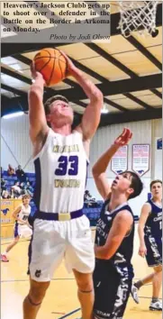  ?? Photo by Jodi Olson ?? Heavener’s Jackson Clubb gets up to shoot over a defender in the Battle on the Border in Arkoma on Monday.