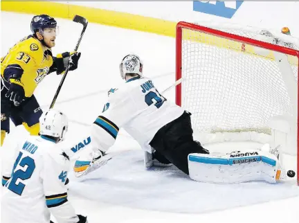  ?? MARK HUMPHREY/THE ASSOCIATED PRESS ?? Nashville Predators centre Colin Wilson — seen scoring on San Jose Sharks goaltender Martin Jones in Game 6 of their NHL playoff series — hopes for a bigger Nashville celebratio­n after Game 7 in San Jose Thursday night.