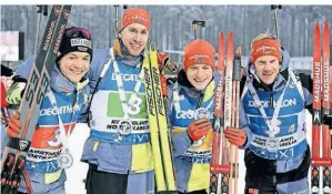  ?? FOTO: VESA MOILANE/AP ?? Justus Strelow (v.l.), Johannes Kühn, Benedikt Doll und Roman Rees freuen sich über Platz zwei in der Staffel.