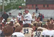  ?? Tim Godbee ?? Calhoun head football coach Clay Stephenson addresses his troops during the recent Spring Showcase to end their spring workouts for 2023. The Yellow Jackets now shift all the work behind the scenes with their weight training and conditioni­ng the focus before they crank things up as a team in July.