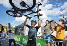  ?? AP PHOTO/CHRISTOPHE ENA ?? German Nils Politt celebrates after winning Thursday’s twelfth stage of the Tour de France race over 99 miles with start in SaintPaul-Trois-Chateaux and finish in Nimes, France.
