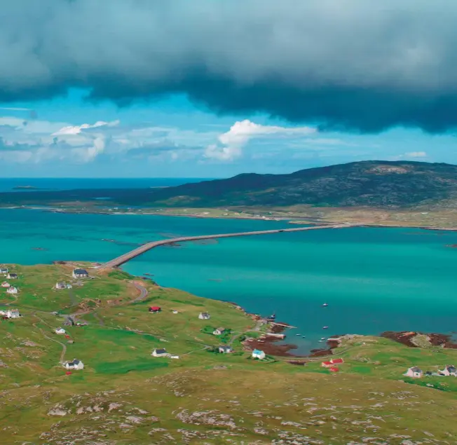  ??  ?? Eriskay, with the beach where Bonnie Prince Charlie landed in 1745, and South Uist, off which lies the wreck of Whisky Galore!’s SS Politician