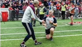  ?? SPORTSFILE ?? Mutual respect: Galway manager Henry Shefflin shakes hands with Cork selector Diarmuid O’Sullivan after the game