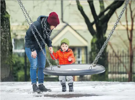  ?? ARLEN REDEKOP ?? Tamara Herman, seen with her 21/2-year-old son Emil Porter at their home in east Vancouver, says she hopes Tuesday’s budget will include money for affordable child care. “We would like to be in a licensed daycare, but it is absolutely impossible,” she...