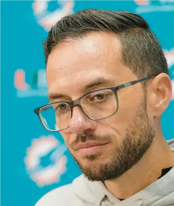  ?? ALEX BRANDON/AP ?? Dolphins coach Mike McDaniel speaks with reporters after Sunday’s game against the Washington Commanders in Landover, Maryland. The Dolphins are No. 1 in the AFC through Week 13.