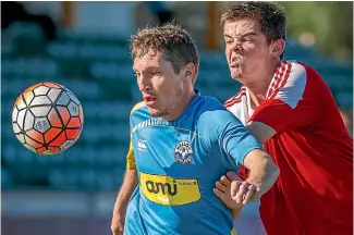  ?? PHOTO: JOHN KIRK-ANDERSON/FAIRFAXNZ ?? Nelson Suburbs’ Sam Ayers, left, and FC Twenty’s Callum Smith jostle for possession on Saturday. Nelson won 4-1.