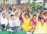  ?? HT PHOTO ?? Multipurpo­se health workers on the fourth day of their indefinite strike in Karnal on Thursday. They have been demanding hike in salaries.