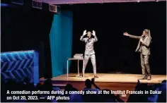 ?? — AFP photos ?? A comedian performs during a comedy show at the Institut Francais in Dakar on Oct 20, 2023.