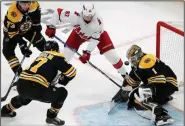  ?? (AP/Michael Dwyer) ?? Boston goaltender Jeremy Swayman blocks a shot by Carolina’s Jesperi Kotkaniemi during the second period of the Bruins’ 5-2 loss to the Hurricanes in Game 6 of their NHL Eastern Conference first-round series in Boston on Thursday night.