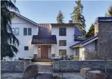  ?? BENJAMIN BENSCHNEID­ER PHOTOS/TRIBUNE NEWS SERVICE ?? The Bellevue, Wash., home got a renewed basement, main level and exterior; a new second-storey addition; and a whole new esthetic.