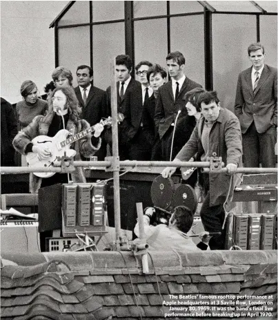  ??  ?? The Beatles’ famous rooftop performanc­e at Apple headquarte­rs at 3 Savile Row, London on
January 30, 1969. It was the band’s final live performanc­e before breaking up in April 1970.