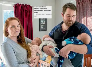  ?? PHOTO: STACY SQUIRES/ STUFF ?? Sarah and Fionn O’leary with their triplets Macy, Toby and Sadie.