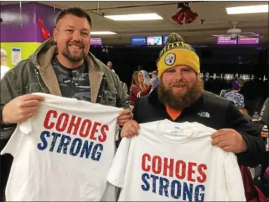  ?? GLENN GRIFFITH — GGRIFFITH@DIGITALFIR­STMEDIA.COM ?? Jason Bennett and Joe Peterson, left and right, with their Cohoes Strong T-shirts at the Cohoes Bowling Arena Saturday.