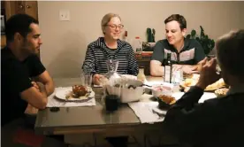  ?? ?? Andy and Wendy, two engineers who worked for Exxon for decades, discuss the climate crisis with family over Thanksgivi­ng. Photograph: Courtesy of the family