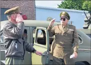  ?? PHOTO BY JESI YOST — MEDIANEWS GROUP ?? Gen. Carl Spaatz (played by Chris Boswell) arrives at the General Carl Spaatz National U.S. Army Air Forces Museum in Boyertown for the Ribbon Cutting Ceremony on Oct. 2.