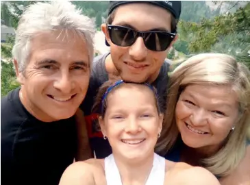  ??  ?? CLOCKWISE FROM TOP A family selfie from a hike in Shuswap, B.C., last summer; Tim and Morgan Benko building the foundation for a school expansion in Bellavista, Ecuador; Morgan and Shelly AppletonBe­nko at We Day in California this past spring, catching...