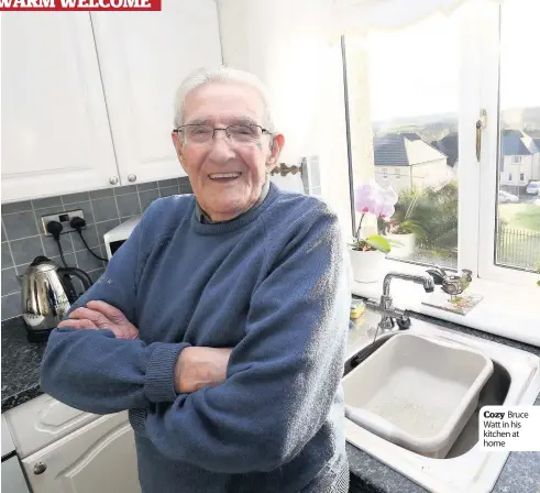  ??  ?? Cozy Bruce Watt in his kitchen at home