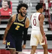  ?? Stacy Revere / Getty Images ?? Isaiah Livers scored 20 points to lead the way for Michigan in its return from a three-week layoff.