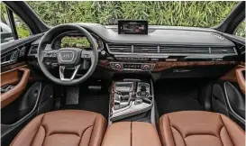  ??  ?? With the redesign of the 2017 Audi Q7 crossover, luxury is improved with highqualit­y interior materials, outstandin­g comfort, and availabili­ty of the latest easy-to-use infotainme­nt technology. Seven-passenger seating is standard.